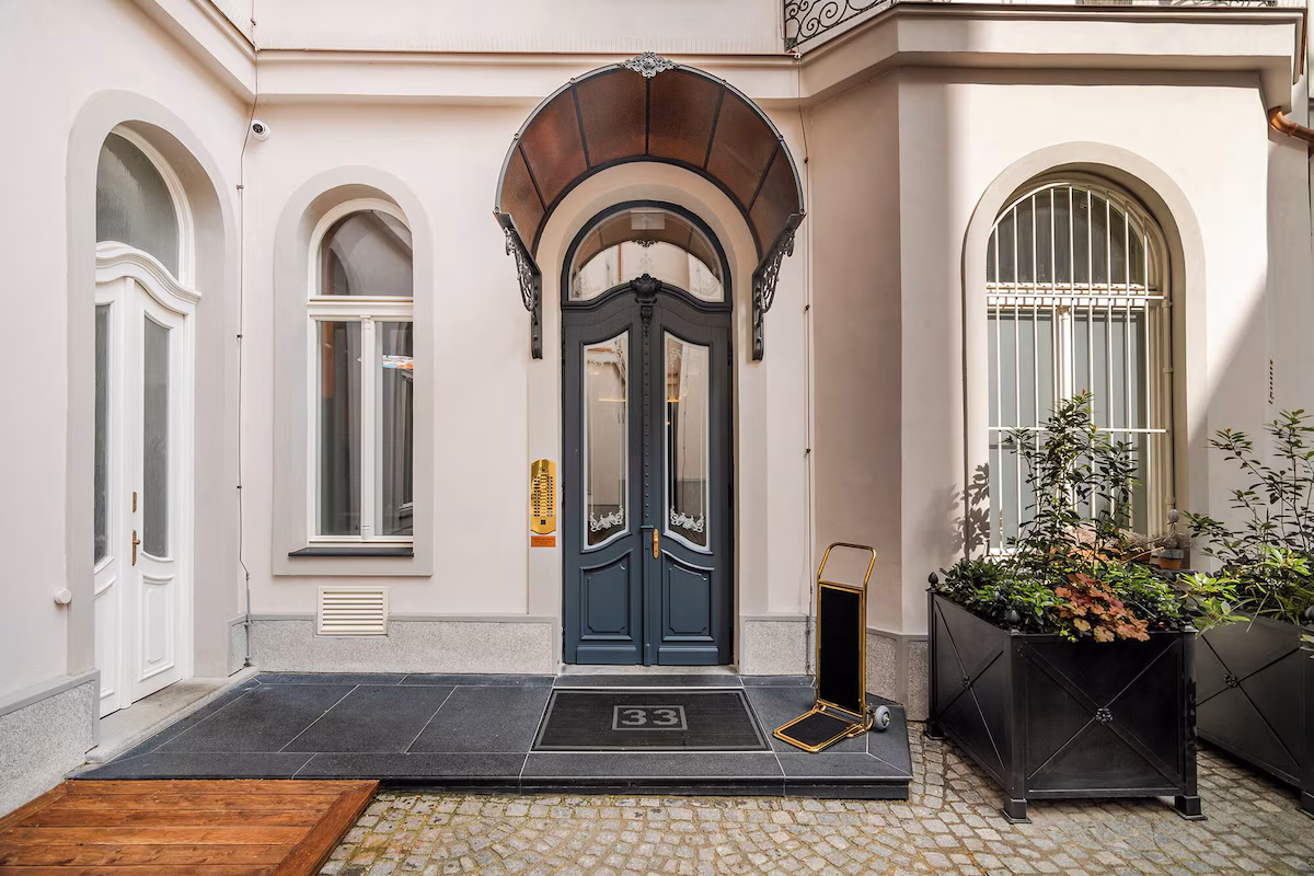 Residential building entrance shown for the Brenhomes case